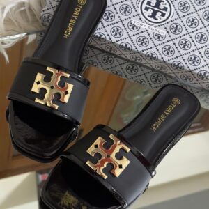 Buy Tory Burch flat slippers for women in Pakistan. Sizes 36–42 available. Premium packaging with brand box. Price Rs. 3200. Shop online at Shop2Door now!
