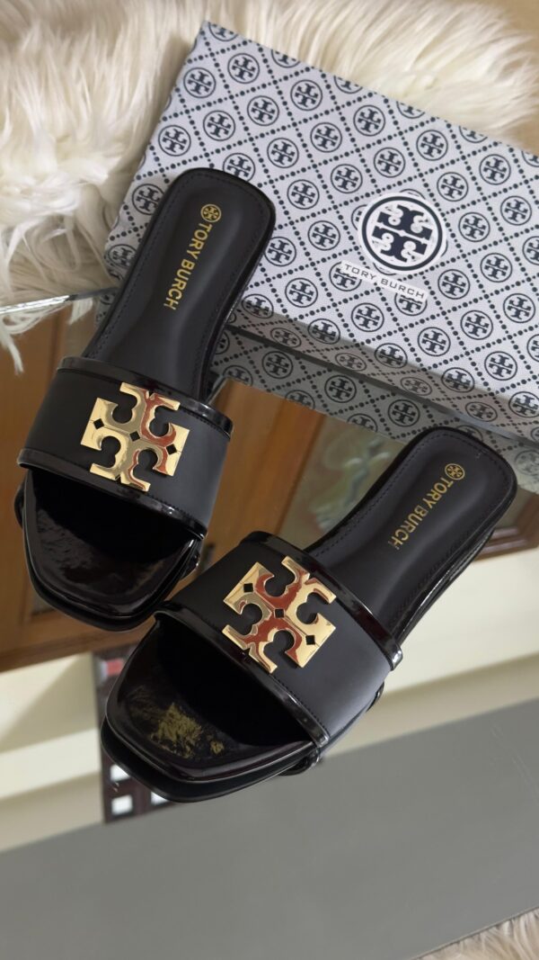 Buy Tory Burch flat slippers for women in Pakistan. Sizes 36–42 available. Premium packaging with brand box. Price Rs. 3200. Shop online at Shop2Door now!