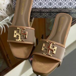 Buy Tory Burch flat slippers for women in Pakistan. Sizes 36–42 available. Premium packaging with brand box. Price Rs. 3200. Shop online at Shop2Door now!