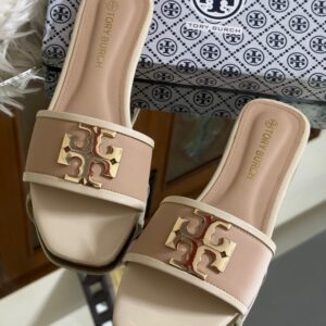 Buy Tory Burch flat slippers for women in Pakistan. Sizes 36–42 available. Premium packaging with brand box. Price Rs. 3200. Shop online at Shop2Door now!