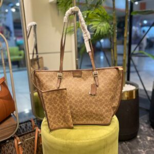 Coach Taxi Tote Bag in Signature Canvas for Women in Pakistan