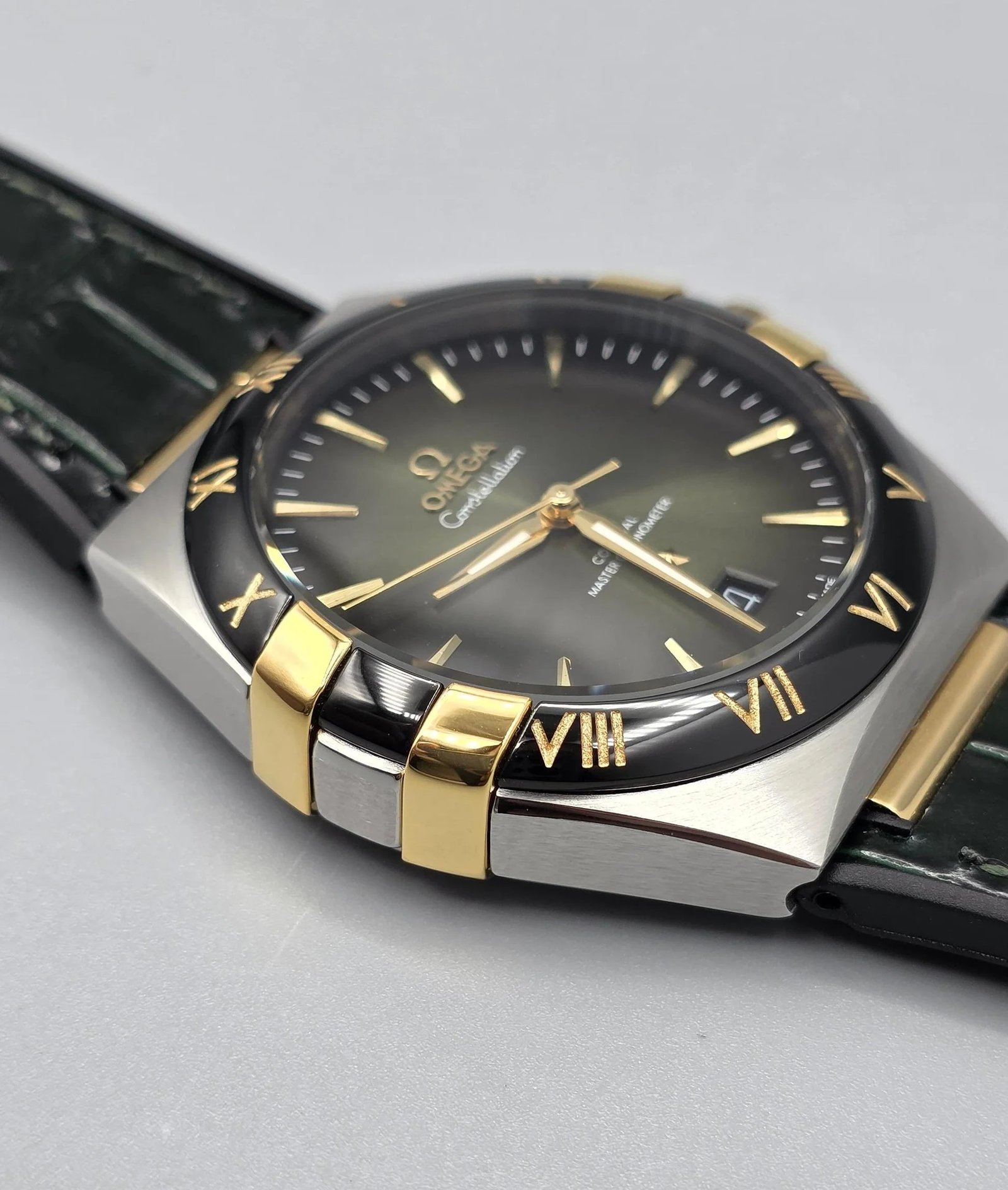 Omega Luxury Silver & Gold Watch – Black Bezel, Rubber Strap watch in Pakistan
