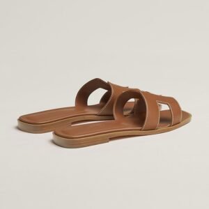 Women's Oran-style H-cutout flat sandals in brown and black